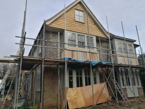 Thin coat render to cement board and monocouche to blockwork on a refurb in Milford Surrey.