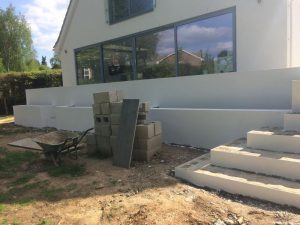 Thin coat render system on a new build house and outdoor eating area in Sevenoaks